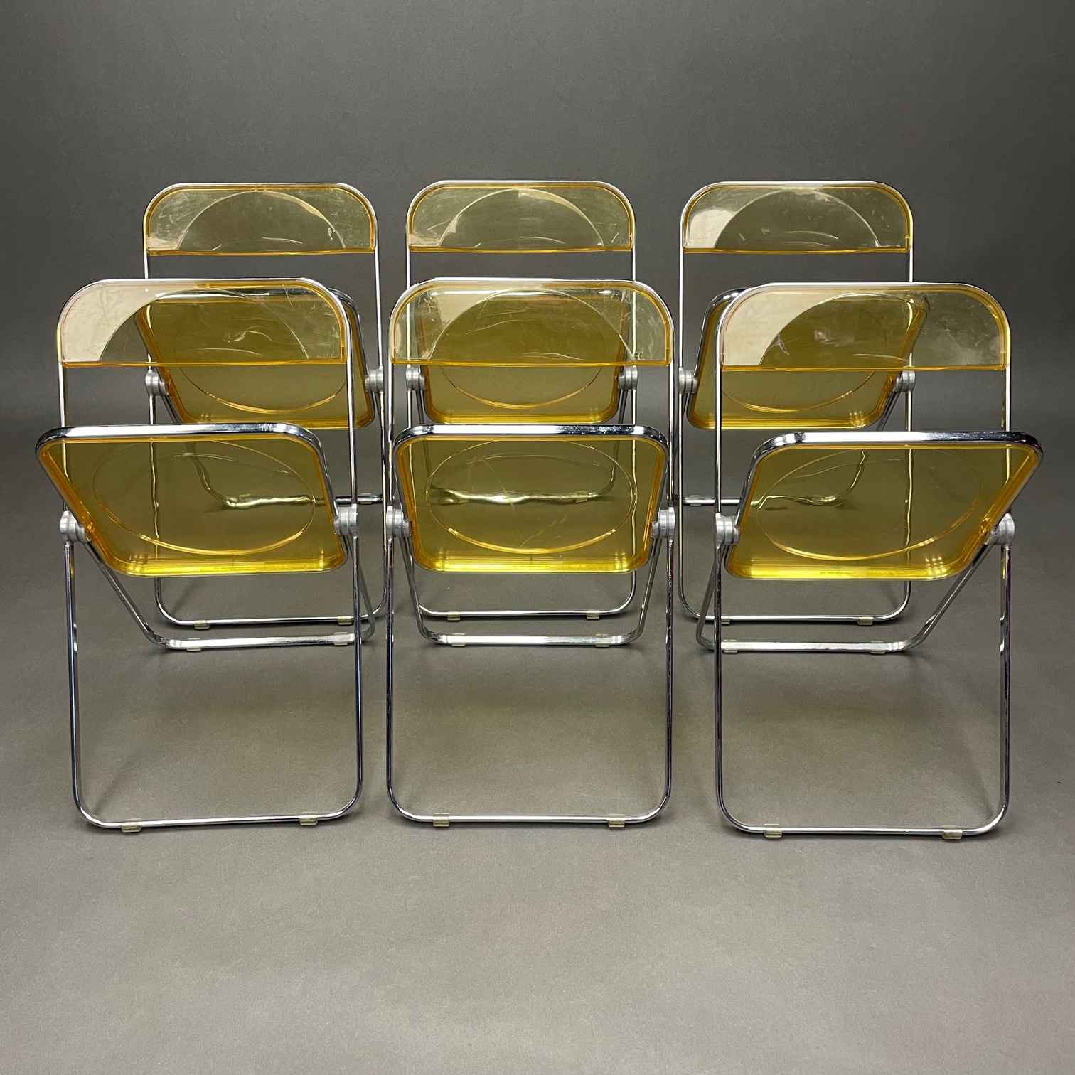 Lot de 6 Chaises Plia Jaune Giancarlo Piretti Anonima Castelli Lot de 6 Chaises Plia Jaune Giancarlo Piretti Anonima Castelli